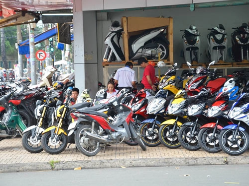 Nguy cơ phá sảncủa các nhà sản xuất xe máy - 1