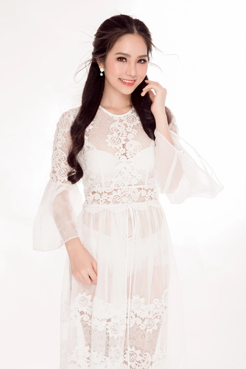 Hoa hậu áo dài biển dương kim ánh đẹp hút hồn với váy trắng tinh khiết