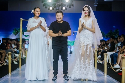 Diệu huyền bế bụng bầu 8 tháng lên sàn diễn catwalk