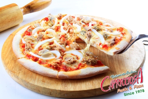 Mua pizza được tặng mỳ spaghetti tại capricciosa