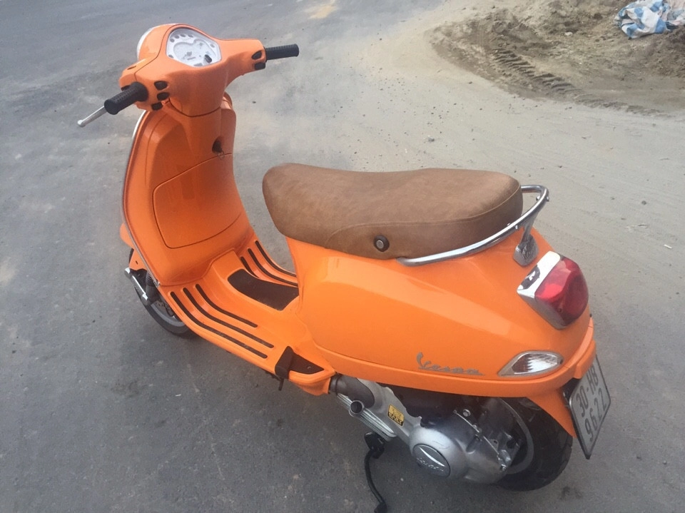 Vespa lx 150 nhập italy đời chót cuối cùng 2010 màu vàng cam