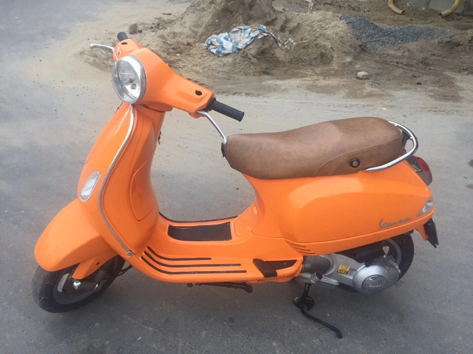 Vespa lx 150 nhập italy đời chót cuối cùng 2010 màu vàng cam